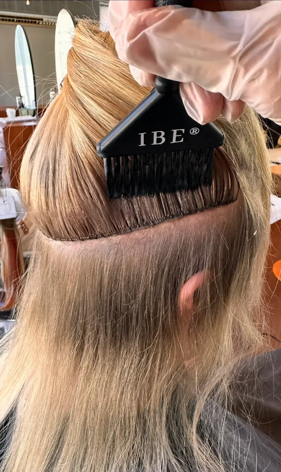 Certified Invisible Bead Extensions install in progress with the IBE brush