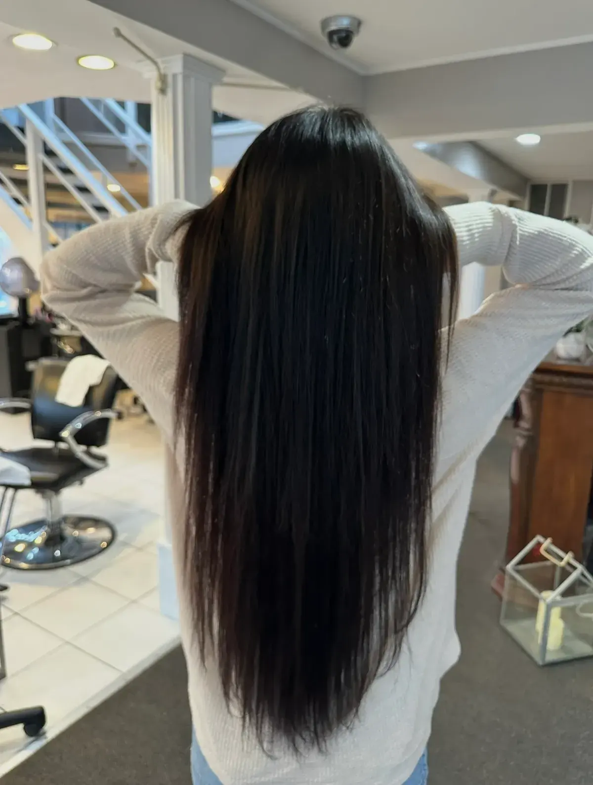 Long, glass-smooth sleek dark hair